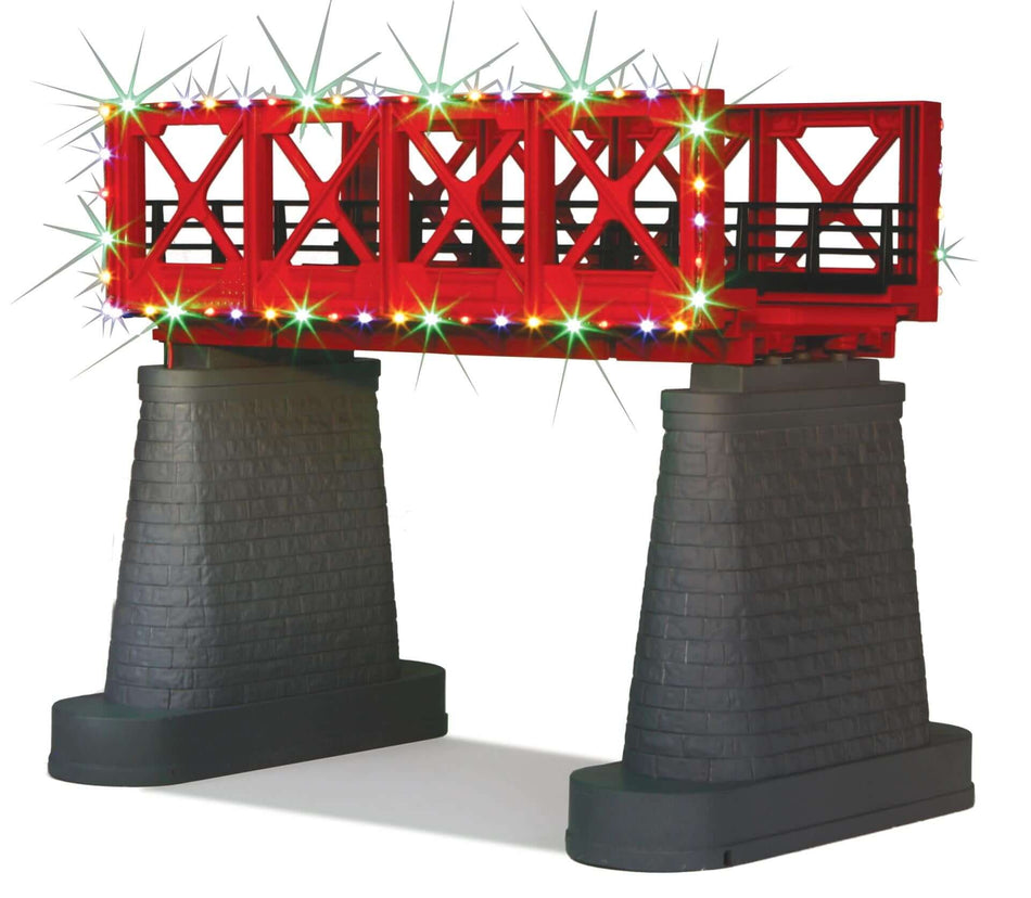 POUTRE ROUGE DU PONT AVEC GUIRLANDE DE NOËL ALLUMÉE