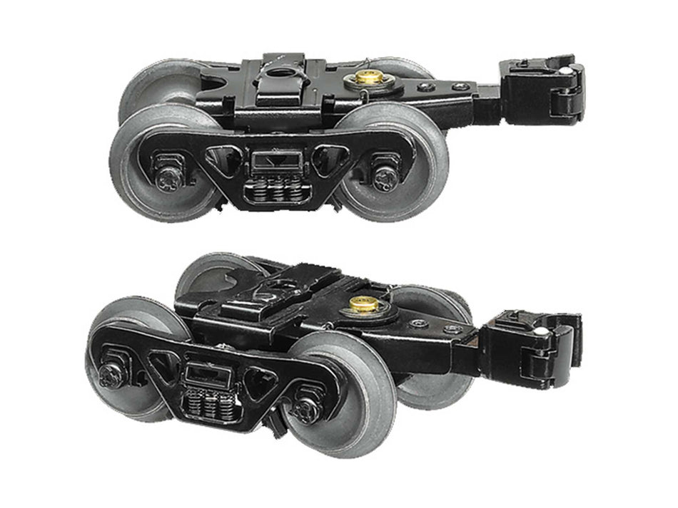 DIE-CAST METAL SPRUNG TRUCKS WITH ROTATING BEARING CAPS